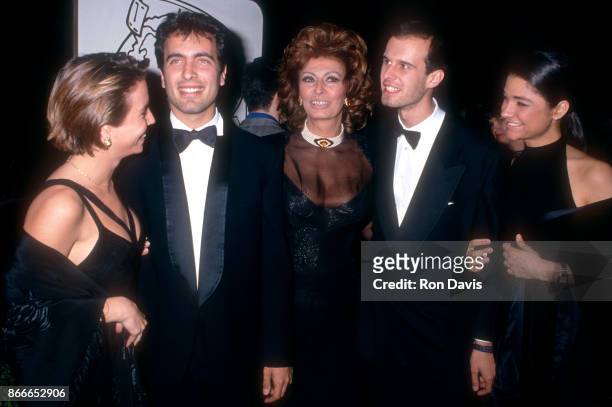 Actress Sophia Loren poses for a potrait with her sons Carlo Ponti Jr. And Edoardo Ponti before the 52nd Annual Golden Globe Awards on January 21,...