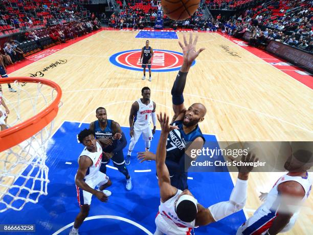 Taj Gibson of the Minnesota Timberwolves shoots the ball against the Detroit Pistons on October 25, 2017 at Little Caesars Arena in Detroit,...