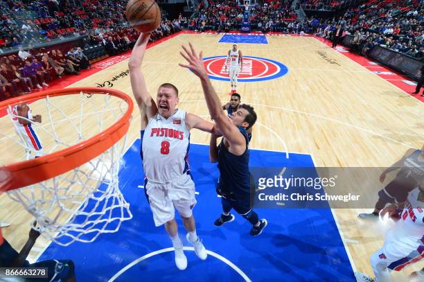 Henry Ellenson of the Detroit Pistons drives to the basket against the Minnesota Timberwolves on October 25, 2017 at Little Caesars Arena in Detroit,...