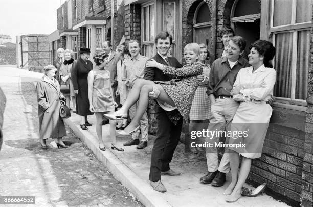 New street setting for 'Coronation Street'. Granada TV have built an outdoor set for shooting some of the scenes. Pictured are cast members: Cast...