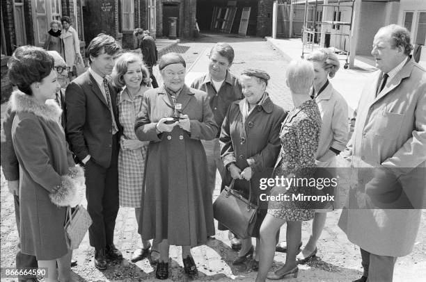 New street setting for 'Coronation Street'. Granada TV have built an outdoor set for shooting some of the scenes. Pictured are cast members: Emily...