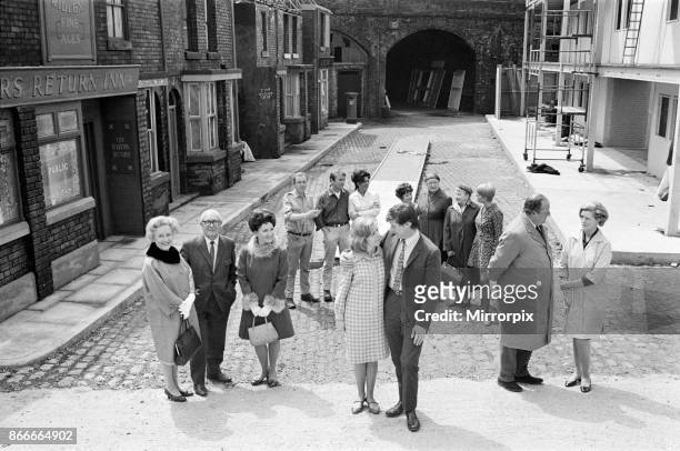 New street setting for 'Coronation Street'. Granada TV have built an outdoor set for shooting some of the scenes. Pictured are cast members: Gerry...