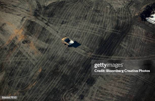 aerial views of oil sands operations - oil sands stock pictures, royalty-free photos & images