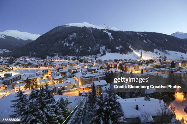 preparations for the davos world economic forum - davos stock pictures, royalty-free photos & images