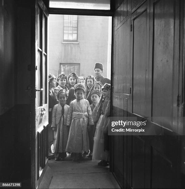 Children attend the Peel Street Mosque in Tiger Bay, Cardiff, 26th March 1954.
