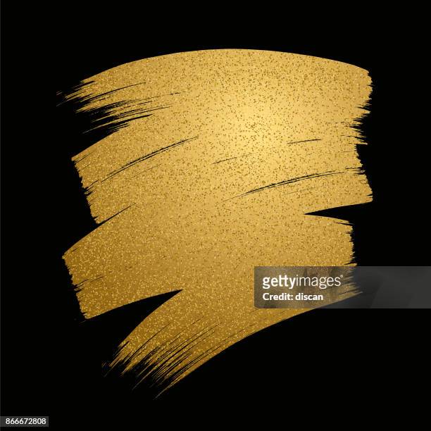 glitter golden brush stroke on black background. vector illustration. - black dye stock illustrations