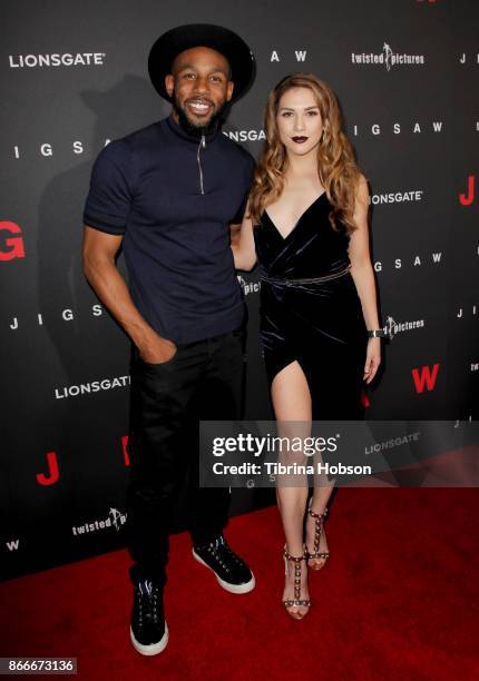 Stephen Boss and Allison Holker attend the premiere of Lionsgate's 'Jigsaw' at ArcLight Hollywood on October 25, 2017 in Hollywood, California.