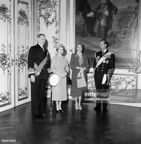 Queen Elizabeth II and Prince Philip, Duke of Edinburgh visit to Denmark. At Amalienborg Palace, left to right, King Frederik IX of Denmark, Queen...
