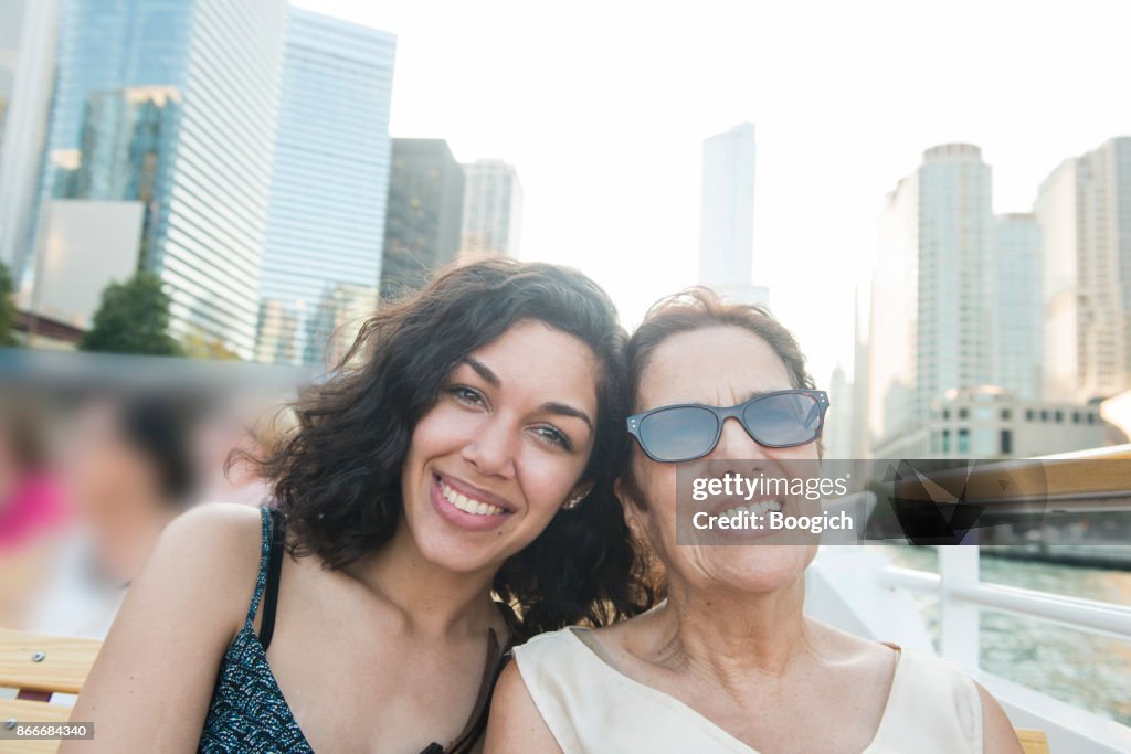 Senior Hispanic Woman and Millennial Granddaughter on Chicago Boat Tour