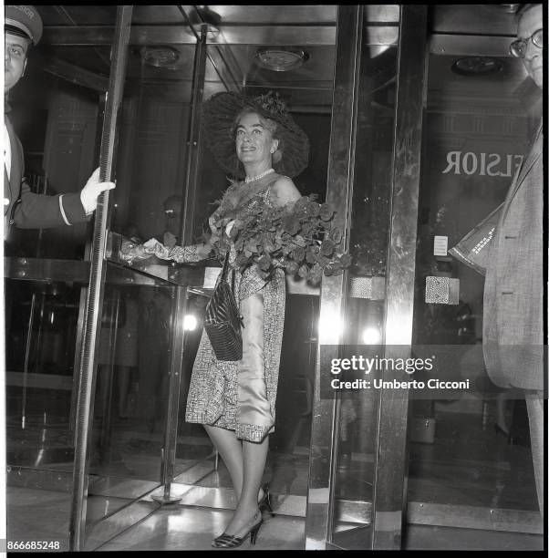 American film and television actress Joan Crawford at the entrance of the hotel in Via Veneto, Rome May 1962.