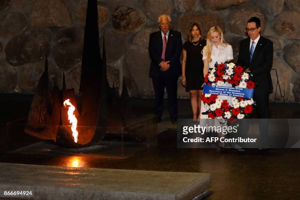 The United States Secretary of the Treasury Steven Mnuchin and his wife Louise Linton lay a wreath at the Hall of Remembrance on October 26, 2017...