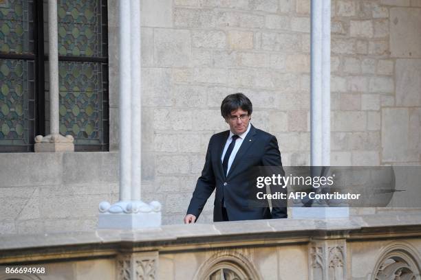Catalan president Carles Puigdemont arrives to give an institutional statement at the 'Generalitat' in Barcelona on October 26, 2017. Catalan leader...