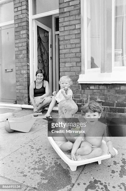 Summer Weather Scenes, Middlesbrough, August 1976, picture shows children keeping cool any way they can during heatwave.