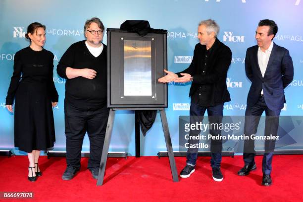 Daniela Michel, Guillermo del Toro, Alfonso Cuaron and Cuauhtémoc Cárdenas Batel unveil a commemorative plaque of the Festival during the red carpet...