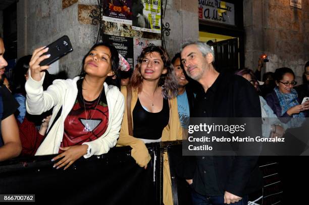 Mexican director Alfonso Cuaron poses with fans during the red carpet of 'The Shape of Water' as part of the XV Morelia International Film Festival...