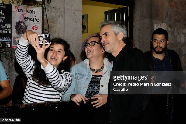 Mexican director Alfonso Cuaron poses with fans during the red carpet of 'The Shape of Water' as part of the XV Morelia International Film Festival...