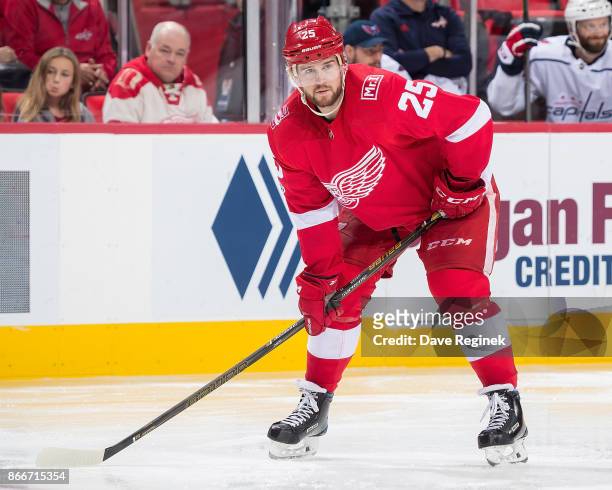 Mike Green of the Detroit Red Wings gets set for the face-off against the Washington Capitals during an NHL game at Little Caesars Arena on October...