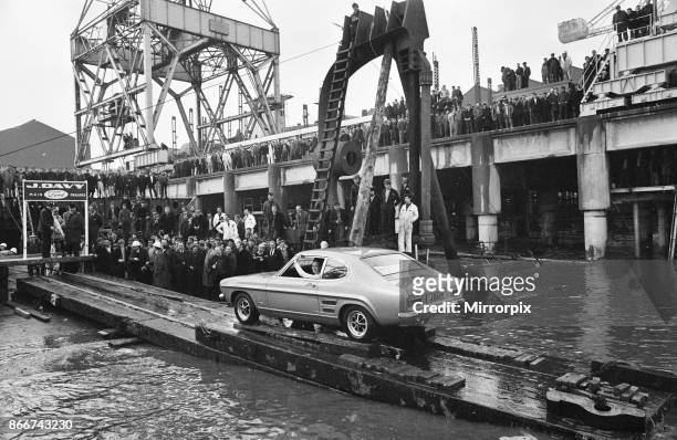 The new Ford Capri, launched in unusual manner off the slipway at the shipbuilding yard of Cammell laird in Birkenhead, Wirall. The car was launched...