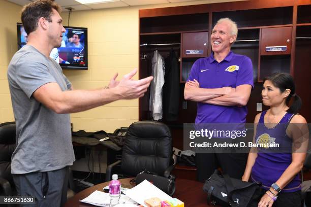 Luke Walton of the Los Angeles Lakers and Former NBA player, Bill Walton talk before the game against the Washington Wizards on October 25, 2017 at...