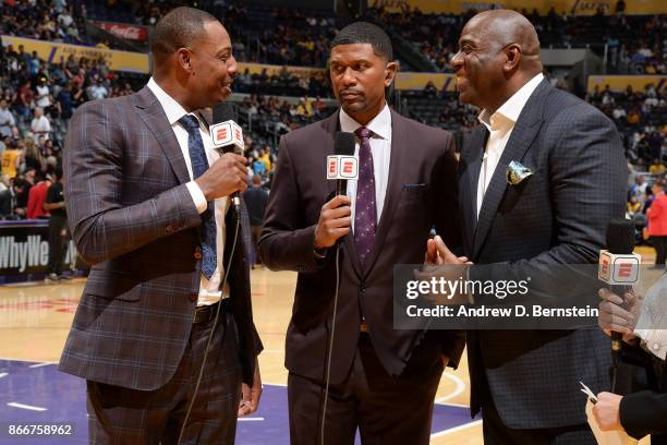 President of Basketball Operations of the Los Angeles Lakers, Magic Johnson talks to ESPN Reporters, Paul Pierce and Jalen Rose after the game...