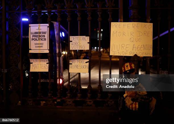 Supporters of Catalonia's independence gather in front of the Catalonian Parliament in Barcelona, Spain on October 26, 2017 during the parliament's...