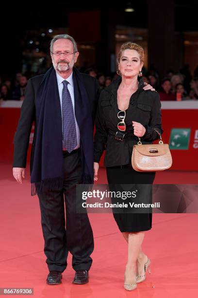 Monica Guerritore and Roberto Zaccaria walk a red carpet for Hostiles during the 12th Rome Film Fest at Auditorium Parco Della Musica on October 26,...