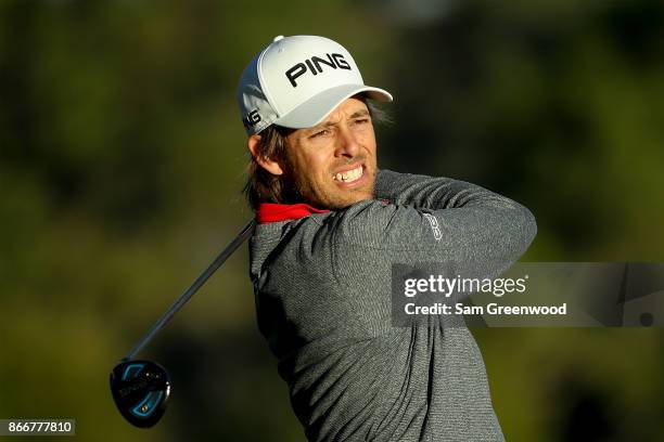 Aaron Baddeley of Australia plays his shot from the second tee during the First Round of the Sanderson Farms Championship at the Country Club of...