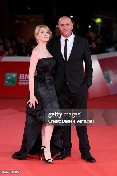 Loredana Cannata and a Francesco Cinquemani walk a red carpet for Hostiles during the 12th Rome Film Fest at Auditorium Parco Della Musica on October...