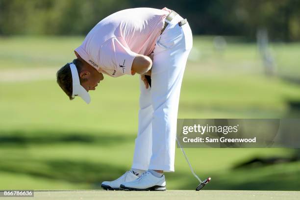 Billy Hurley III reacts to a putt on on the 17th green during the First Round of the Sanderson Farms Championship at the Country Club of Jackson on...