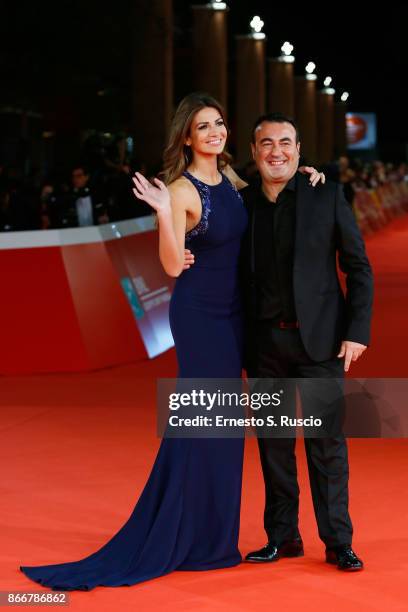 Alessia Ventura and a guest walk a red carpet for 'Hostiles' during the 12th Rome Film Fest at Auditorium Parco Della Musica on October 26, 2017 in...