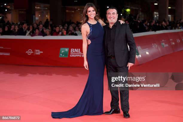Alessia Ventura and a guest walk a red carpet for 'Hostiles' during the 12th Rome Film Fest at Auditorium Parco Della Musica on October 26, 2017 in...