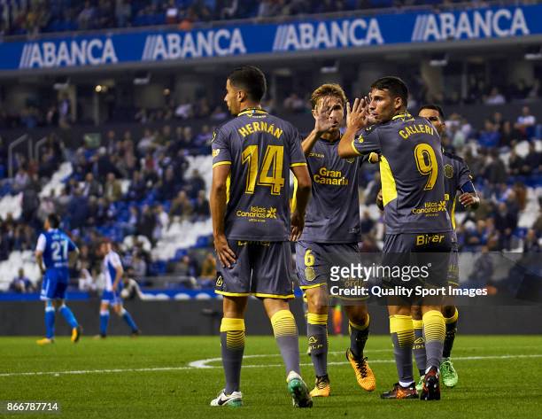 Jonathan Calleri of UD Las Palmas celebrates after scoring the fourth goal with Sergi Samper of UD Las Palmas during the Copa del Rey first leg match...