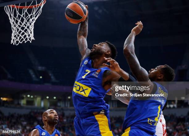 Deandre Kane and Deshaun Thomas of Maccabi jump for the ball during the 2017/2018 Turkish Airlines EuroLeague Regular Season game between Crvena...