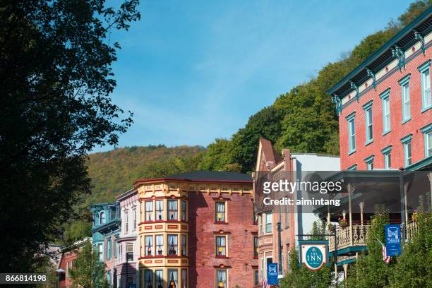 colorful historic buildings on broadway street in downtown jim thorpe - jim thorpe pennsylvania stock pictures, royalty-free photos & images