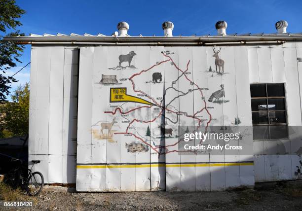 An old garage along Main St. In Naturita Colorado now features a map of the area October 18, 2017.