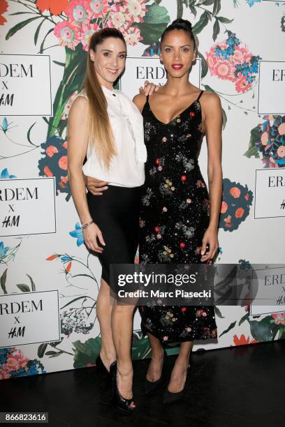 Dancer Claire Francisci of 'Pole Spirit Paris' and model Noemie Lenoir attend the 'ERDEM X H&M' Paris Collection Launch at Hotel du Duc on October...