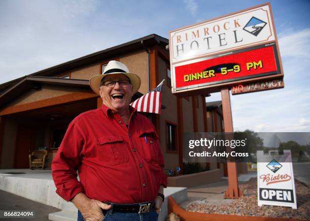 Reed Mitchell, Owner of the Rimrock Hotel in Naturita Colorado has a laugh outside of his hotel October 19, 2017. Reed employs 18 people at the newly...