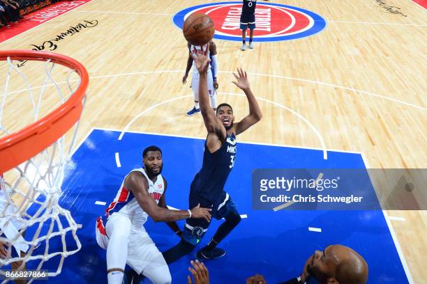 Karl-Anthony Towns of the Minnesota Timberwolves shoots the ball against the Detroit Pistons on October 25, 2017 at Little Caesars Arena in Detroit,...