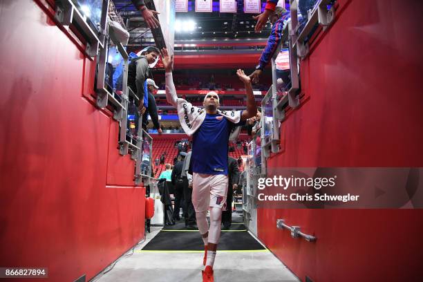 Tobias Harris of the Detroit Pistons gives high five to fans during the game against the Minnesota Timberwolves on October 25, 2017 at Little Caesars...