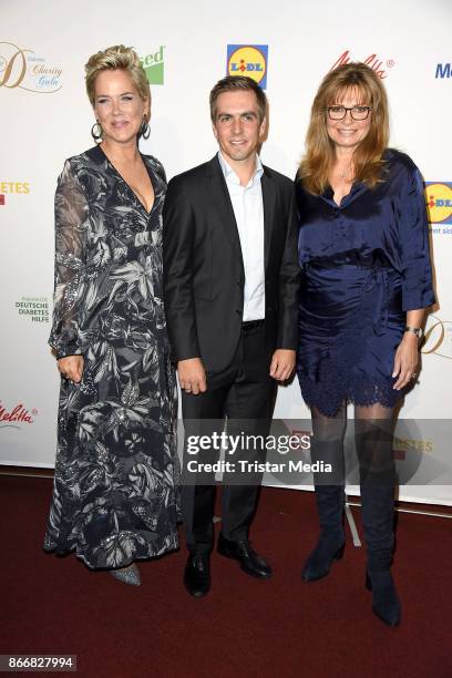 Inka Bause, Philipp Lahm and Maren Gilzer attend the 7th Diabetes Charity Gala at TIPI am Kanzleramt on October 26, 2017 in Berlin, Germany.