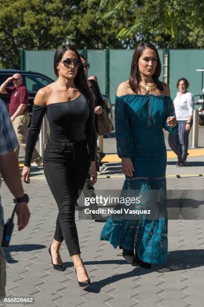 Nikki Bella and Brie Bella visit "Extra" at Universal Studios Hollywood on October 26, 2017 in Universal City, California.