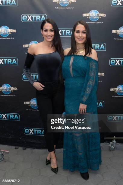 Nikki Bella and Brie Bella visit "Extra" at Universal Studios Hollywood on October 26, 2017 in Universal City, California.