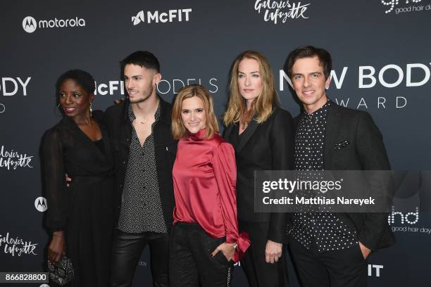 Nikeata Thompson, Baptiste Giabiconi, CEO McFIT Models Anja Tillack, model Tatjana Patitz and Harald Greising attend the New Body Award By McFit...