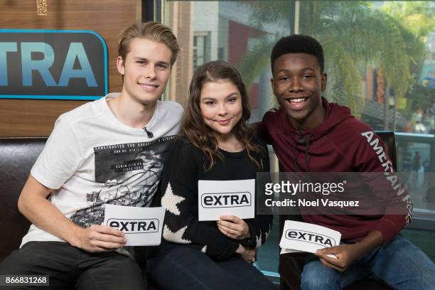 Logan Shroyer, Hannah Zeile and Niles Fitch visit "Extra" at Universal Studios Hollywood on October 26, 2017 in Universal City, California.