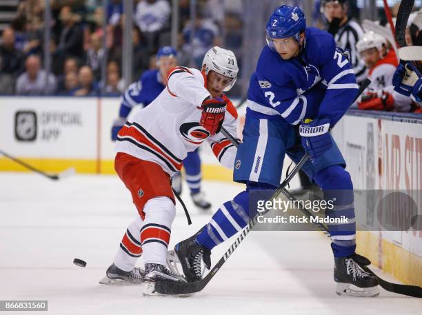Toronto Maple Leafs defenseman Ron Hainsey with a nifty backhand pass in front of Carolina Hurricanes right wing Sebastian Aho . Toronto Maple Leafs...
