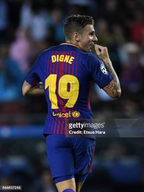 Lucas Digne of Barcelona celebrates scoring his side's third goal during the UEFA Champions League group D match between FC Barcelona and Olympiakos...