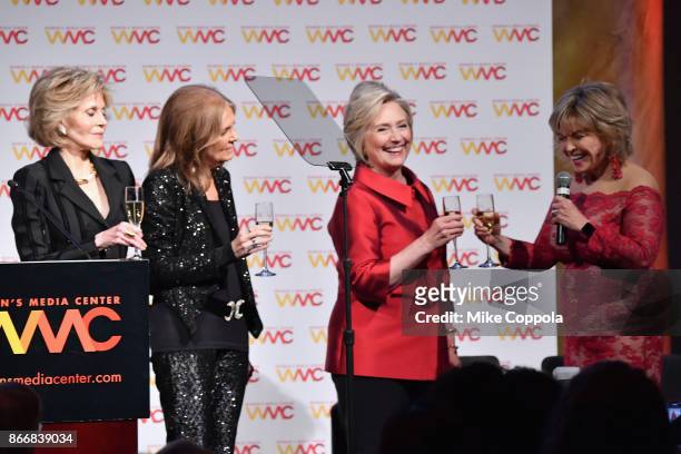 Jane Fonda, Gloria Steinem, Hillary Rodham Clinton, and Pat Mitchell sing Happy Birthday to Hillary Clinton onstage at the Women's Media Center 2017...