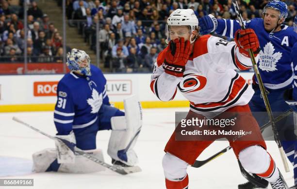 Carolina Hurricanes left wing Brock McGinn celebrates his goal as Toronto Maple Leafs goalie Frederik Andersen kneels. Toronto Maple Leafs VS...