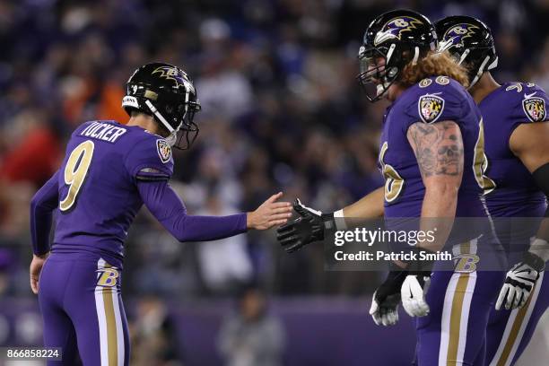 Kicker Justin Tucker of the Baltimore Ravens celebrates after kicking a field goal in the second quarter against the Miami Dolphins at M&T Bank...