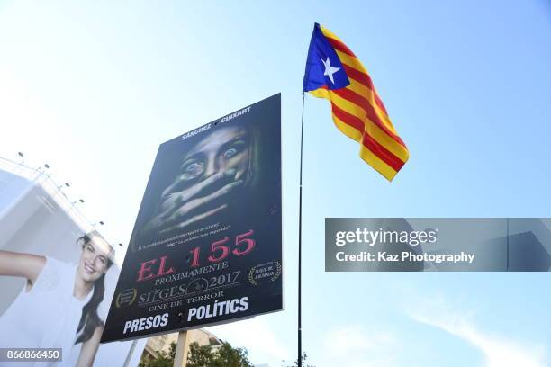 Protesters gather in the city centre to demonstrate against the Spanish federal government's move to suspend Catalonian autonomy on October 21, 2017...
